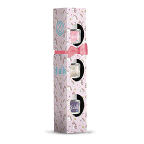 Nail polish set in a decorative box with unicorns and a pink bow on a white background