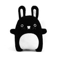 Black and white bunny soft toy with heart shaped nose and white belly
