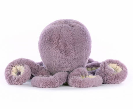 A plush toy resembling an octopus with a smiling face, made of soft purple fabric,