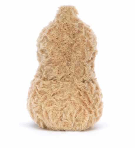A soft plush toy resembling a peanut with a beige tumbly-textured shell, chocolate boots, and a tuft on top of its head.