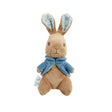 Stuffed small Peter rabbit toy with a blue waistcoat on a white background