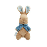 Stuffed small Peter rabbit toy with a blue waistcoat on a white background