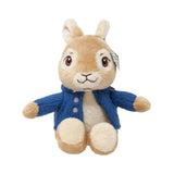 Plush Peter rabbit toy wearing a blue coat on a white background