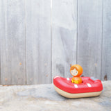 Toy lifeboat with a figure 