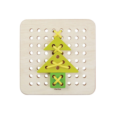 Childrens wooden lacing board with green and yellow shapes