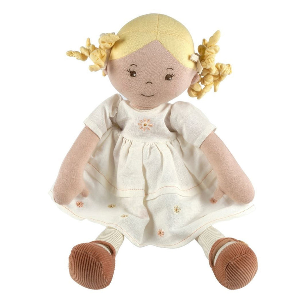 Stuffed doll with blonde hair, wearing a white dress with flower patterns, on a white background.