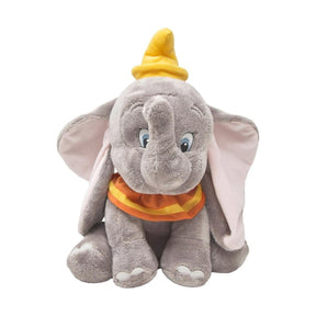 Dumbo plush toy elephant with a yellow hat and orange shirt on a white background