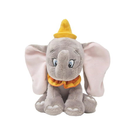 Plush toy Dumbo elephant with a yellow hat and collar on a white background