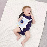 Baby lying on a harry potter Ravenclaw soother comfort blanket wearing a navy blue bodysuit