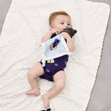 Baby lying on a harry potter Ravenclaw soother comfort blanket wearing a navy blue bodysuit