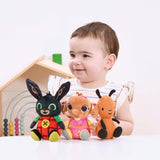 Child with Plush Bing beanie soft toys