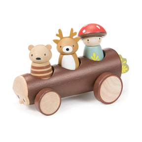 Wooden toy set with a log-shaped car, bear, mushroom, and deer on a white background