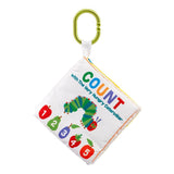 Babies educational soft toy book with colourful numbers and a caterpillar design on a white background