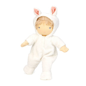 Plush toy baby doll in a white bunny costume on a white background