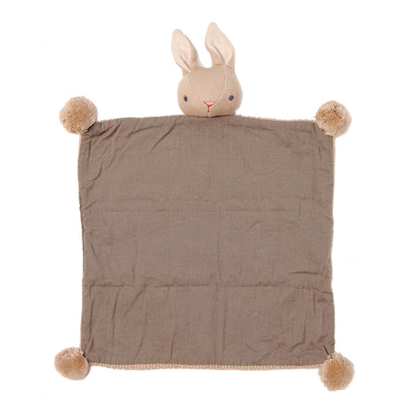 Brown plush blanket with a bunny head and pom-pom ears on a white background