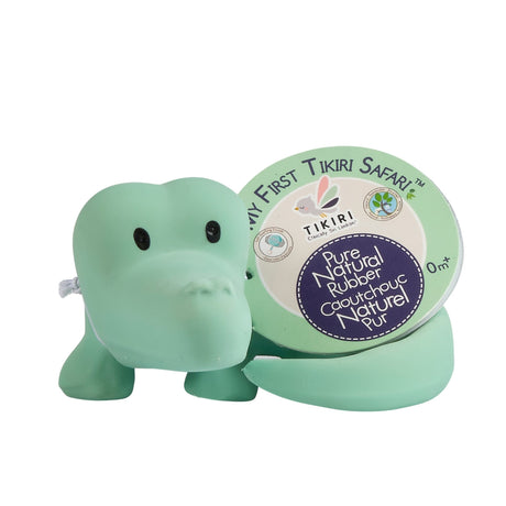 Light green rubber crocodile teether bath toy with label on a white background 