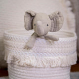 Elephant baby toy in a cloth white basket