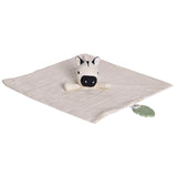A baby muslin comforter with an attached zebra toy and green leaf teether
