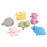 Set of colorful sea creature bath toys on a white background