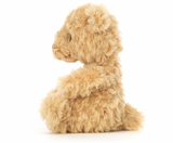 A small, plush, brown teddy bear with a tuft of honey-colored fur, 