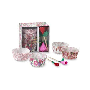 Set of floral cupcake liners with rose-shaped tools in a decorative box on a white background