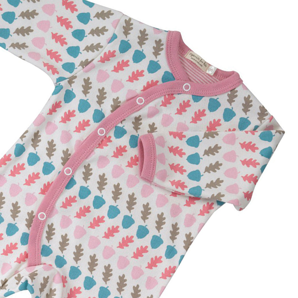 Close up of a superb quality pink Acorn Romper from Pigeon Organics