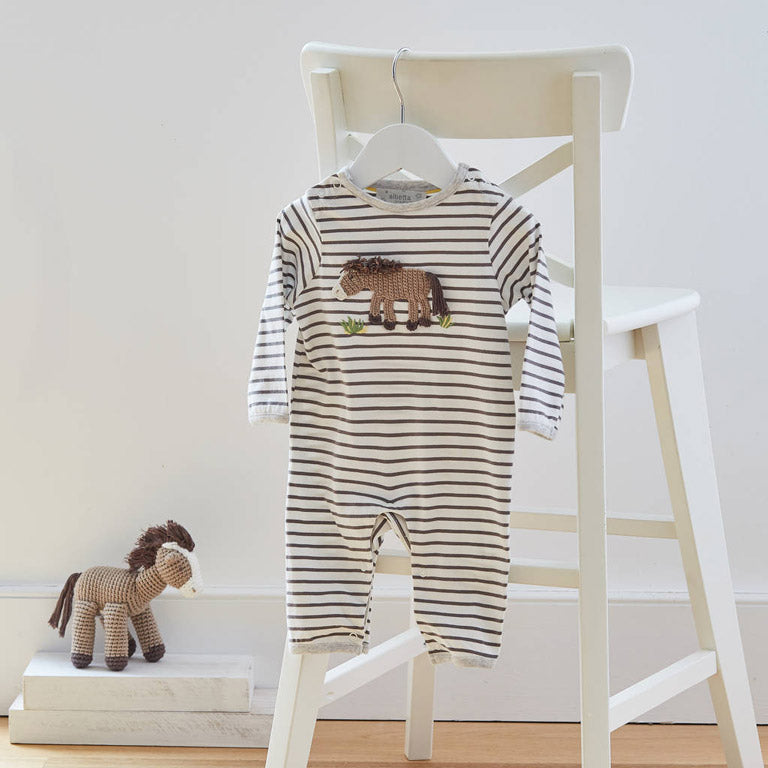 An adorable Albetta babygrow with a beautiful hand crocheted horse 