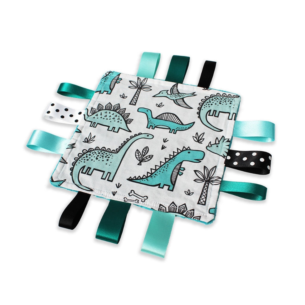 A lovely unique handmade Baby Taggy comforter which can be personalised. Professionally made using 'Dinosaur' fabric