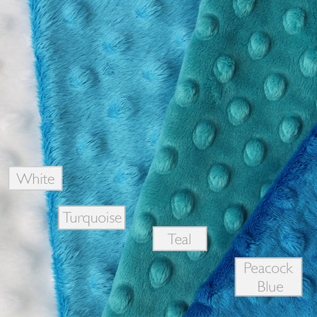 Selection of rear dimble material for a lovely unique handmade Baby Taggy comforter Professionally made using adorable 'Monsters' fabric 