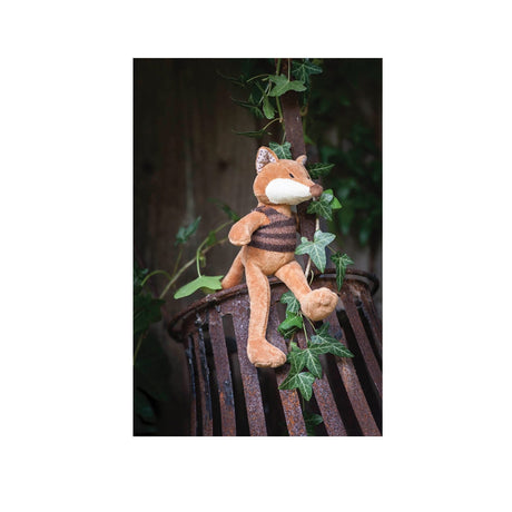 Ragtales Paxton fox baby toy wearing a handmade knitted stripy beige brown top and long bushy tail