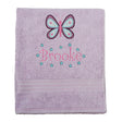 Beautifully embroidered towel with an appliquéd design of a butterfly and personalised with a first name surrounded with either daisies or stars.