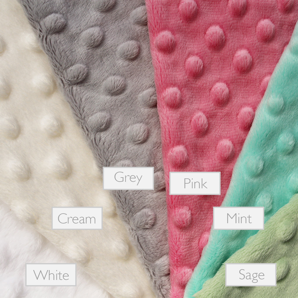 Variety of rear minky fabric for a lovely unique handmade Baby Taggy comforter which can be personalised.