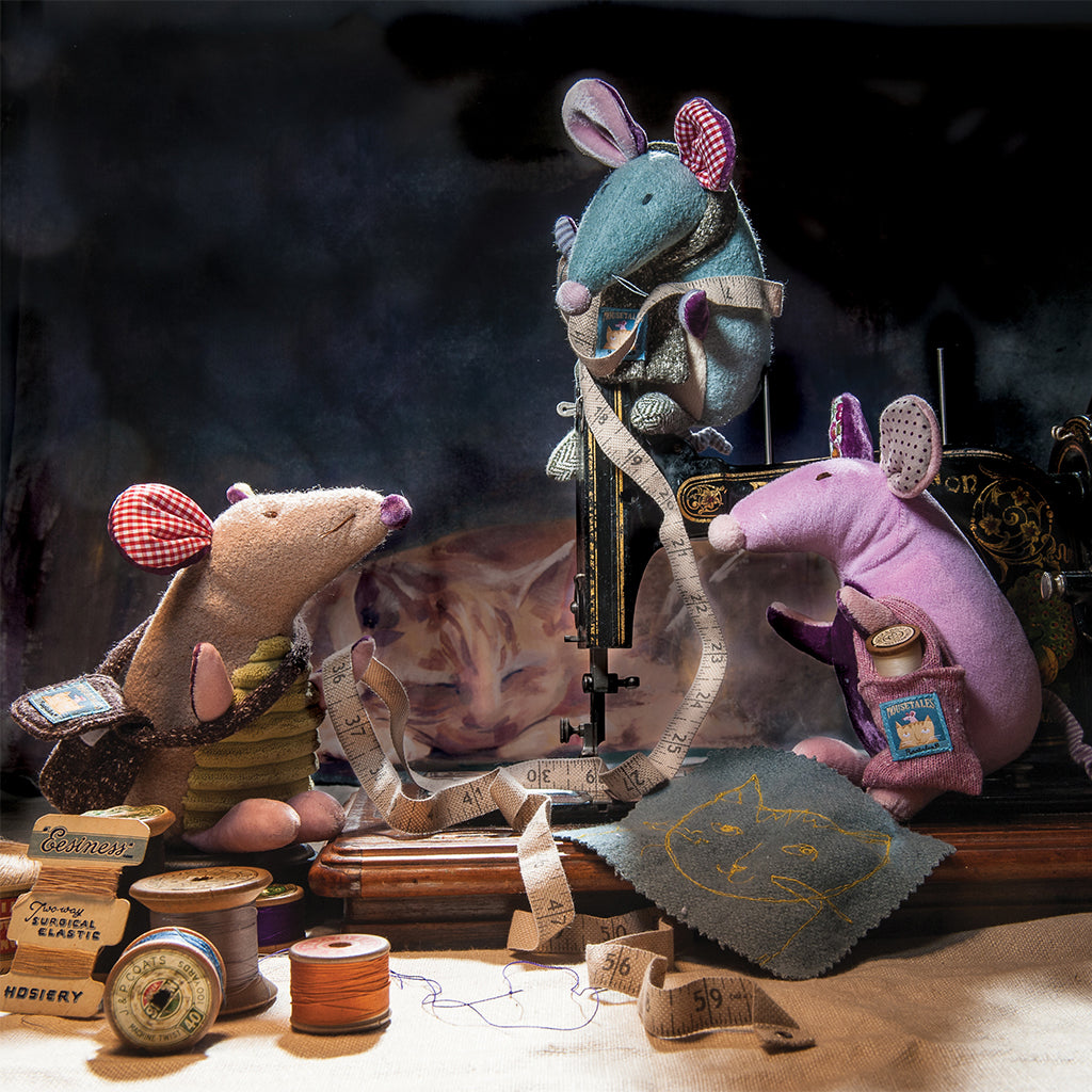 Three Ragtale mice playing together  One is Ragtales Mouse Pom Pom birthday gift with pink and mauve patchwork velour fabric body and shopping bag