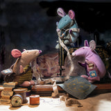 Three Ragtale mice playing together  One is Ragtales Mouse Pom Pom birthday gift with pink and mauve patchwork velour fabric body and shopping bag