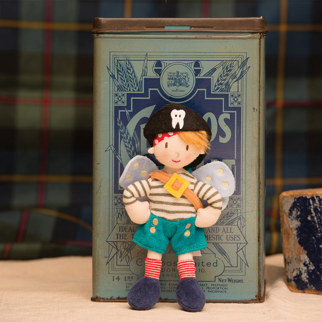 Standing in front of his box Ragtales green soft impish pirate tooth fairy boys gift wearing backpack for lost milk teeth